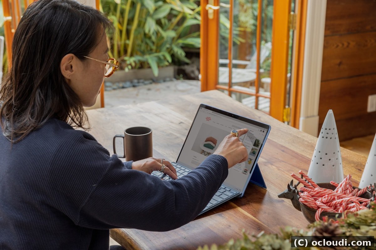 Store owner managing a WooCommerce store from a laptop